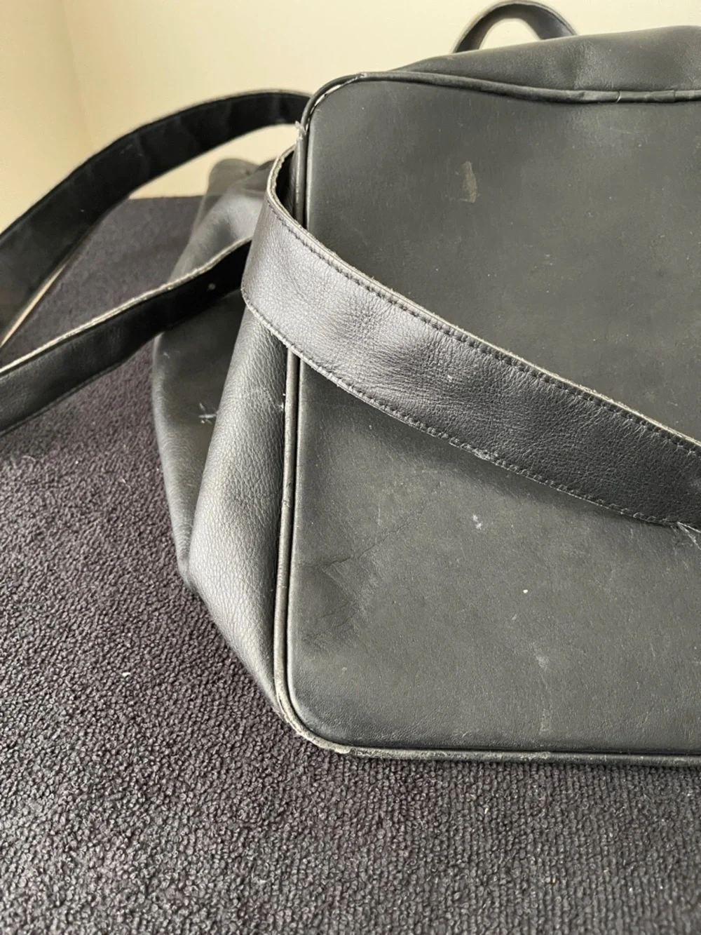 Coach Black Leather Drawstring Backpack with Front Zip Pocket